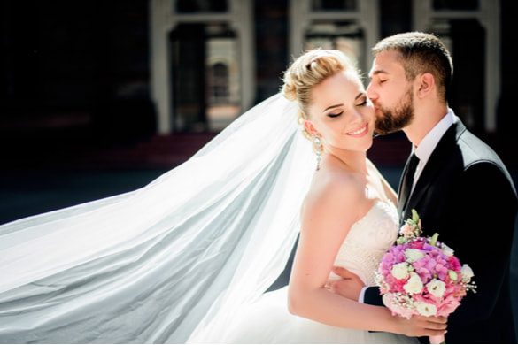 bride and groom embracing