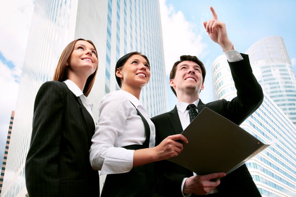 business people meeting outside in big city