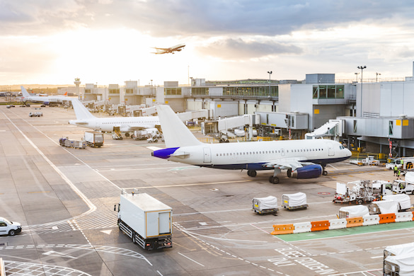 airplanes line up at their gates at the Austin airport